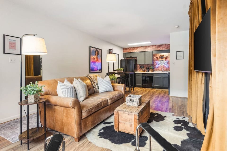 Cozy living room with a smart TV and a sleeper sofa. No stairs in this condo and located on the ground level, for easy access.