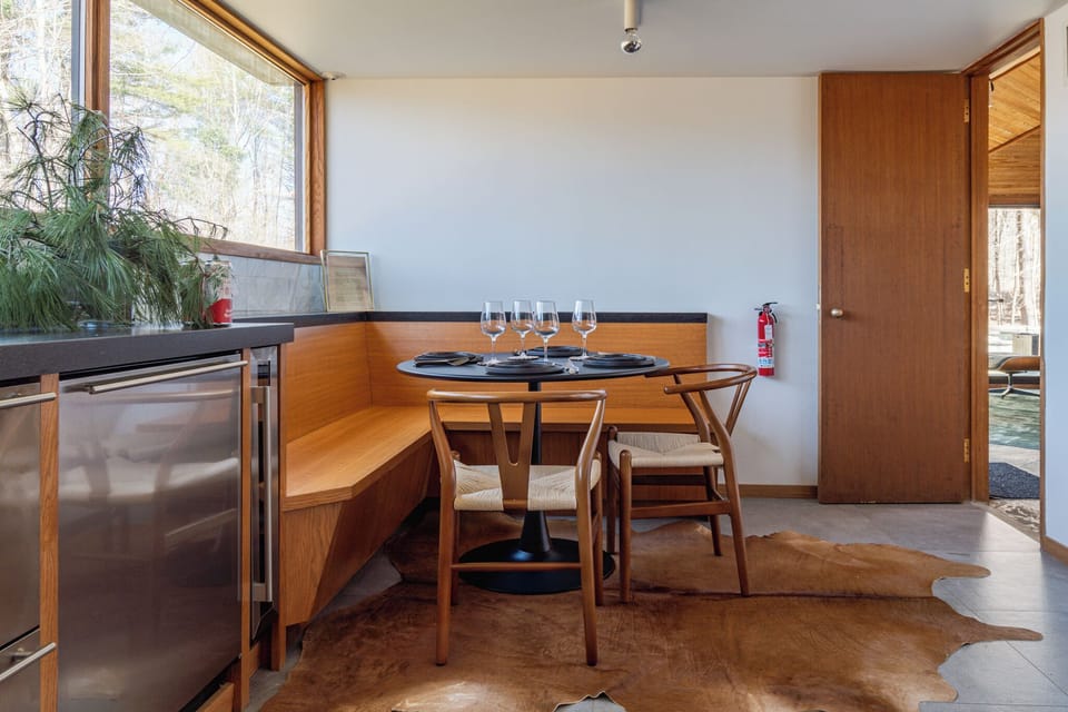 The eat-in kitchen makes for an effortless and chic dining experience.