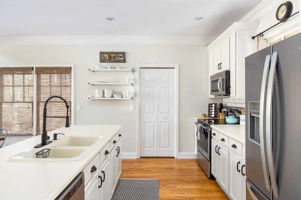 Kitchen: Modern appliances meet stylish design for culinary adventures!