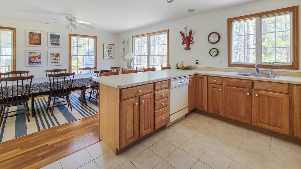Nicely equipped kitchen with dining area beyond