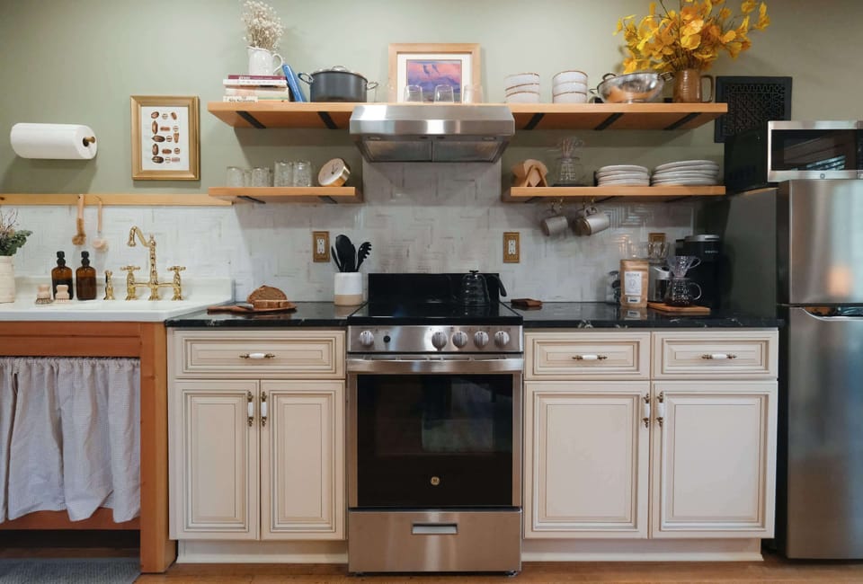 Fully stocked custom kitchen with designer details.