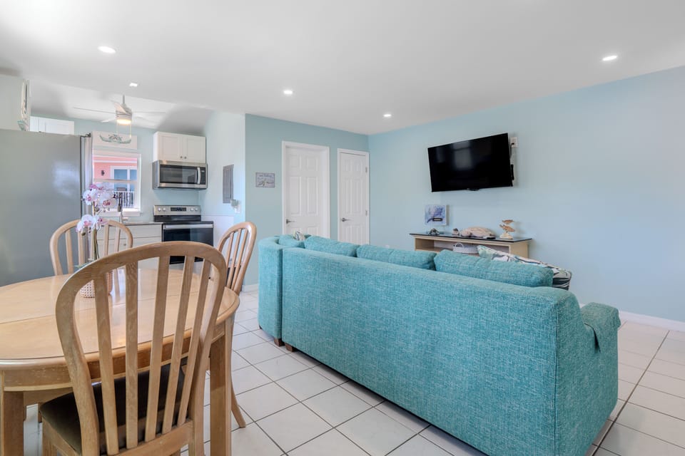 Dining and kitchen just steps away.