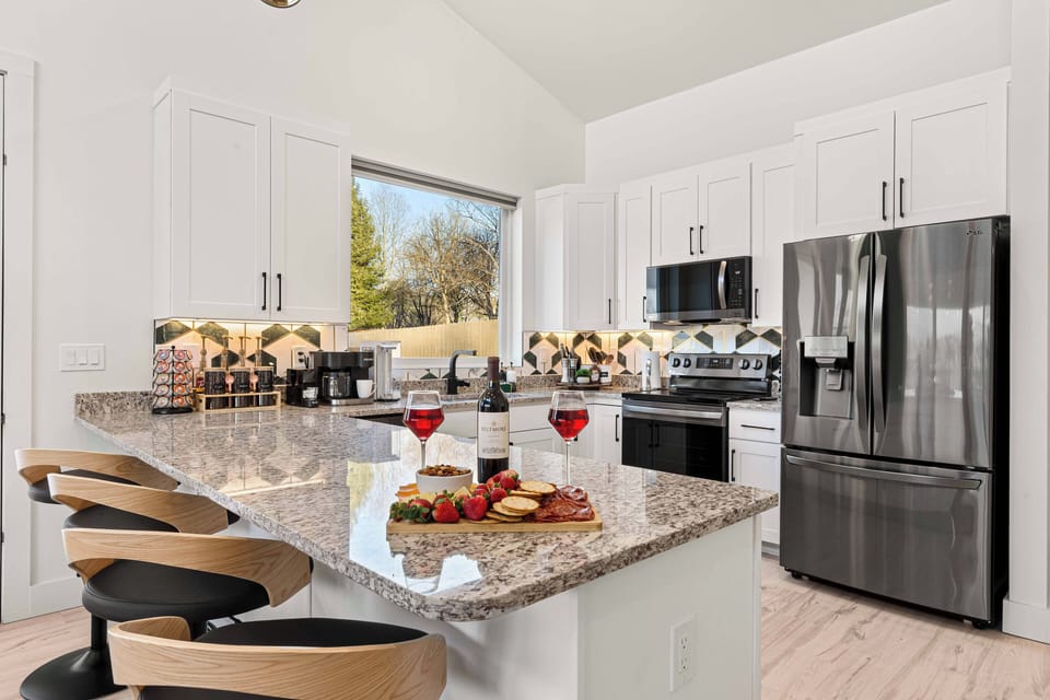 Brand new appliances, fully stocked coffee bar and well equipped kitchen.