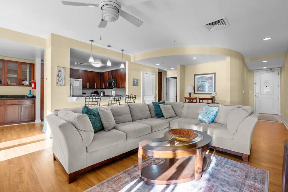 Cozy up with a book or enjoy laughter-filled moments in this stylish, airy living area.