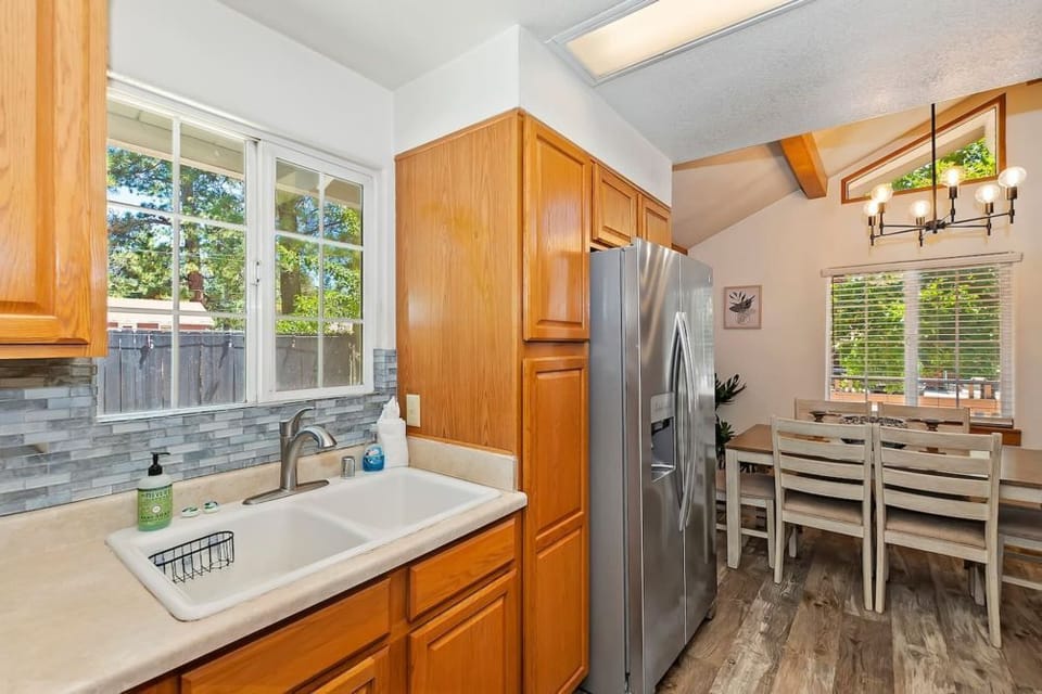 The cabin's kitchen is fully stocked, and features a microwave, dishwasher, blender, toaster and a coffee pot. (coffee not provided)