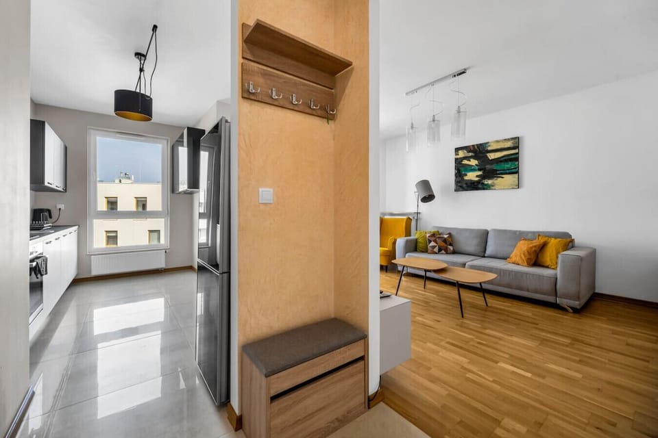 Main Living Area with a Smart TV | Book Now with RENTUJEMY.COM