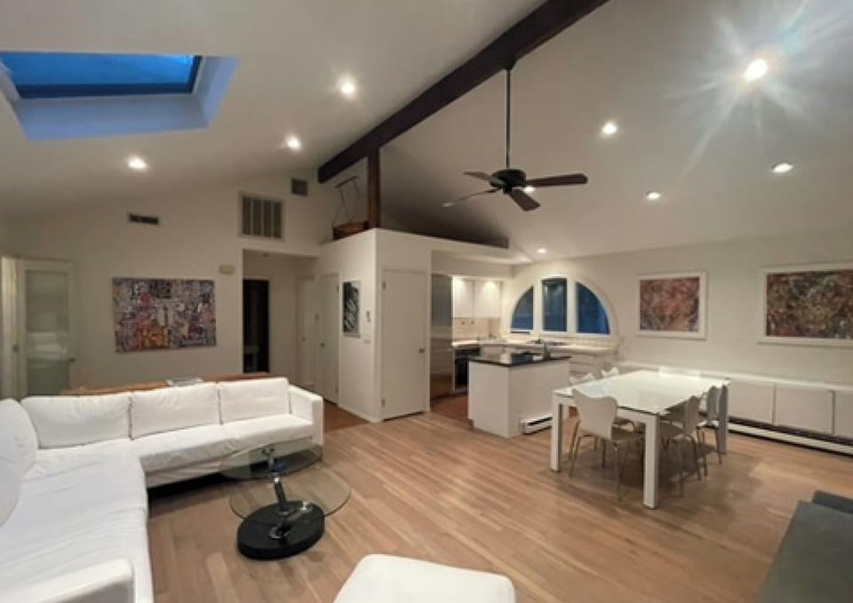 Open-concept living area. 
Dining table expands to seat 10.