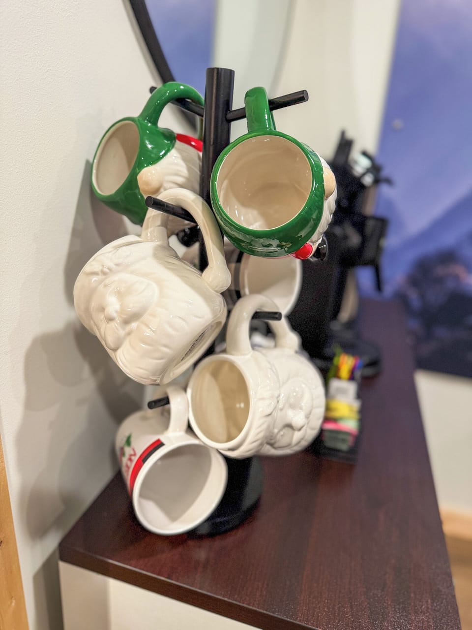 Festive holiday mugs are ready for cozy mornings with hot cocoa or coffee.