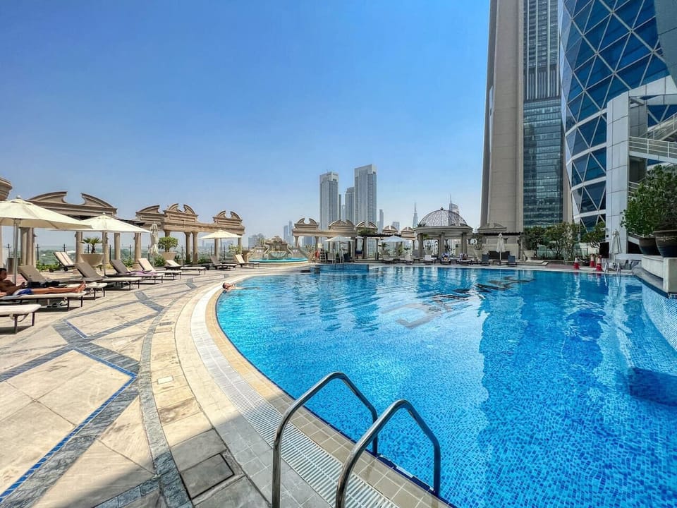 Rooftop Oasis: Dive into luxury at our stunning pool with city skyline views!