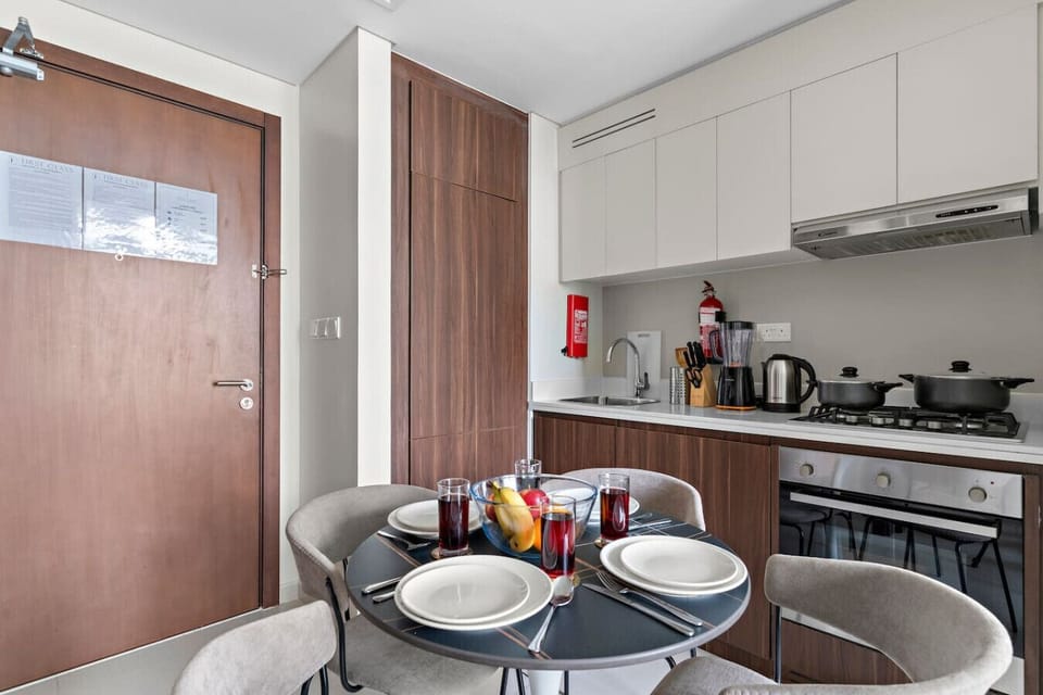 Kitchen: Modern elegance awaits! Cook up a storm in this stylish, well-equipped space.
