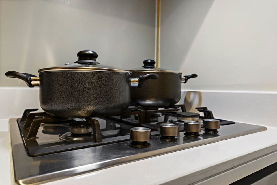 Kitchen: Whip up culinary delights in a sleek, modern kitchen with all the essentials!