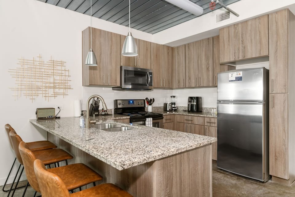 Prepare delicious meals in this modern kitchen with all the essentials.