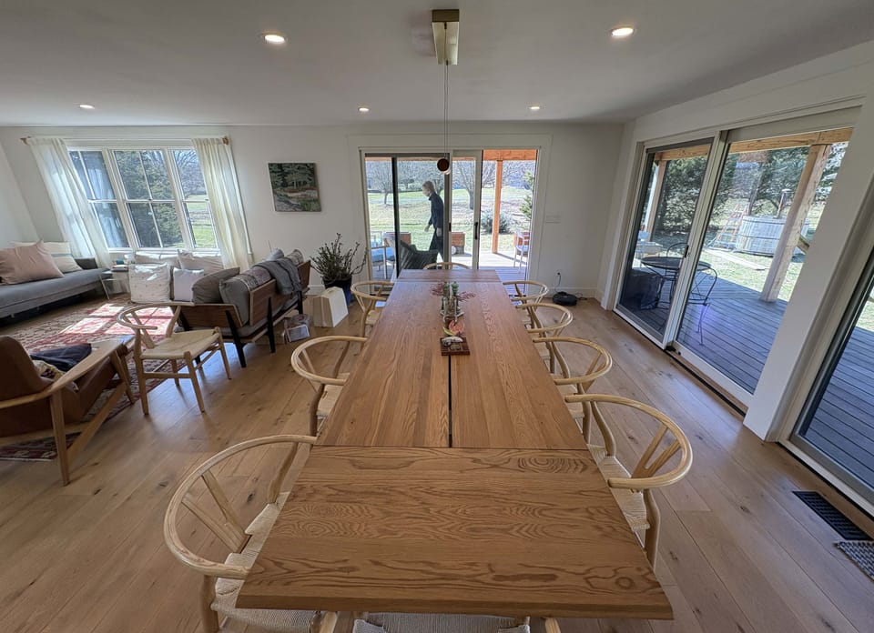 Large dining table with seating for family meals and group gatherings