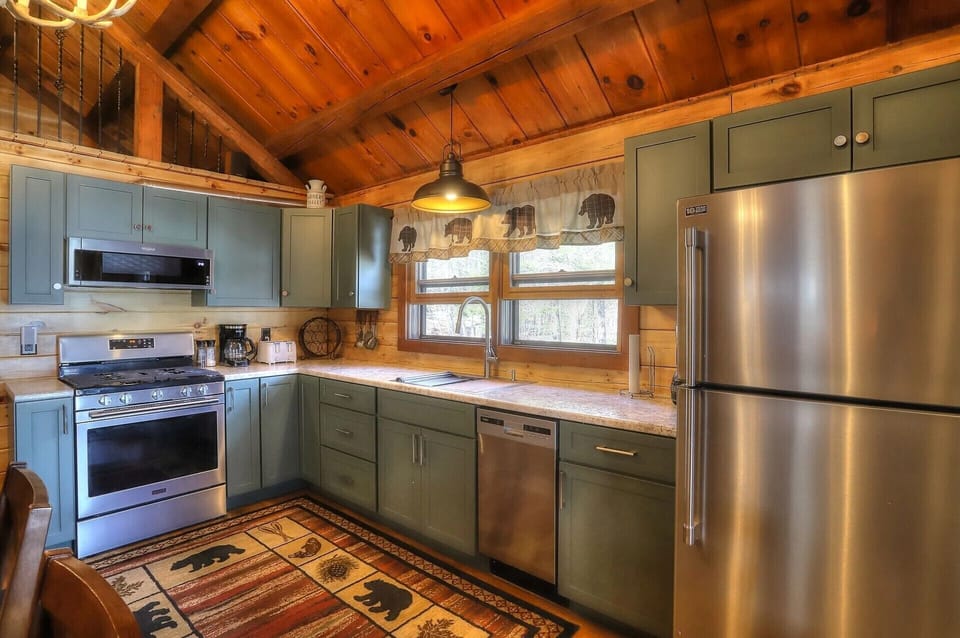 gas range with hood/microwave, dishwasher, chef sink and full size refridgerator