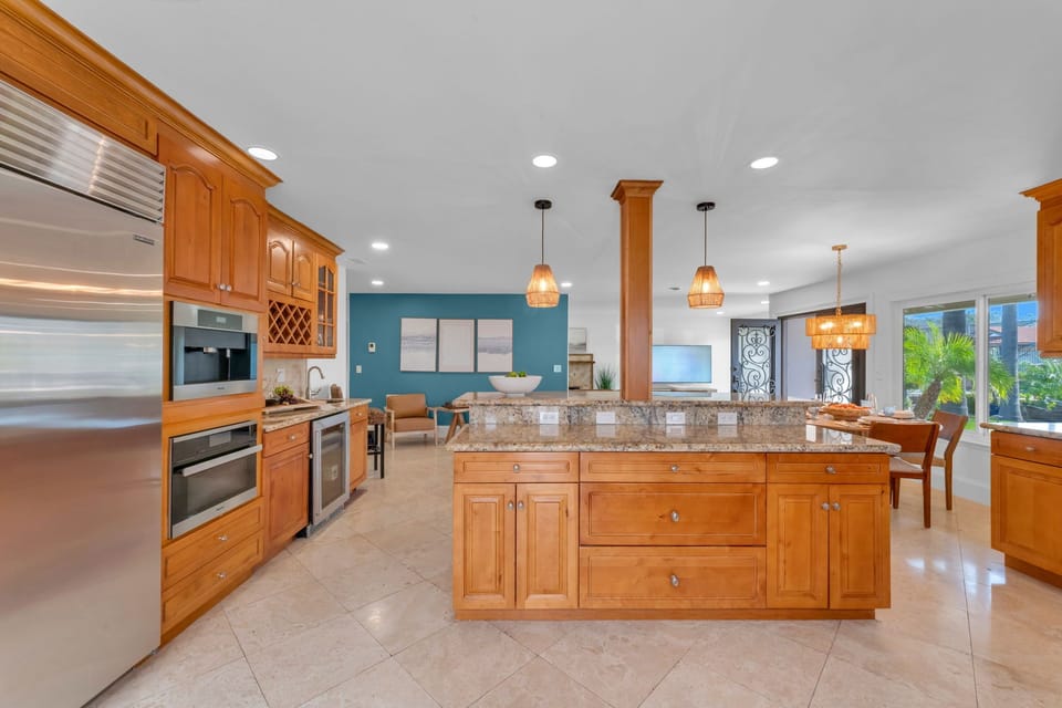 Experience a high-end chef’s kitchen with luxury finishes, a Sub-Zero fridge, Thermador appliances, and an espresso machine for the perfect start to your day.