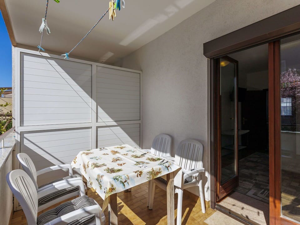 Flooring, Interior Design, Floor, Apartment, Balcony, Ceiling, Condominium, Chair, Shade, Porch