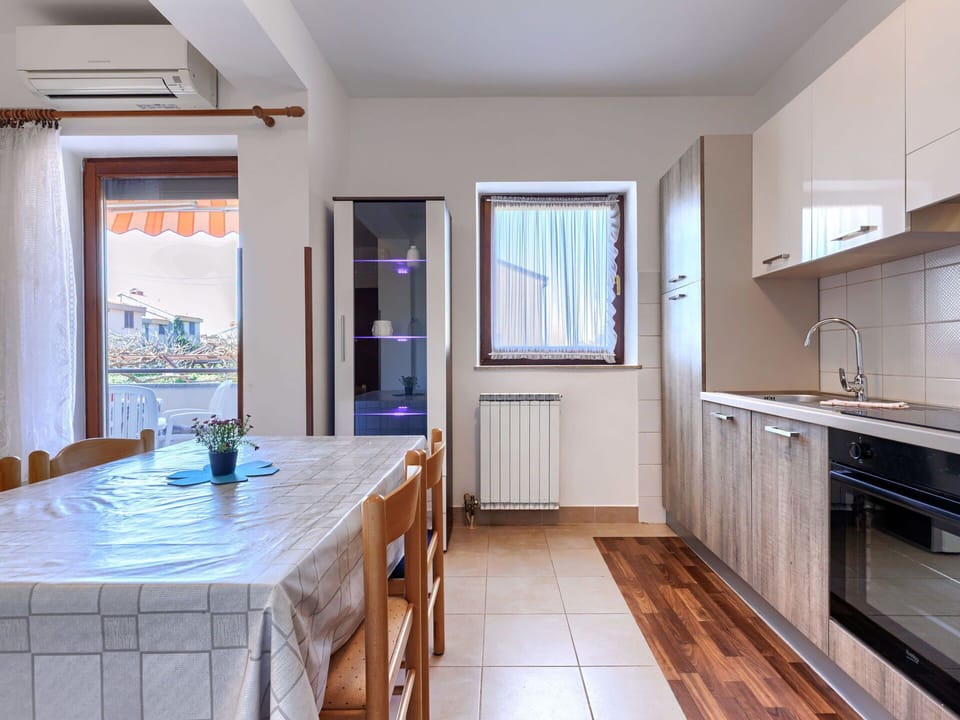 Flooring, Interior Design, Floor, Apartment, Balcony, Ceiling, Condominium, Chair, Shade, Porch