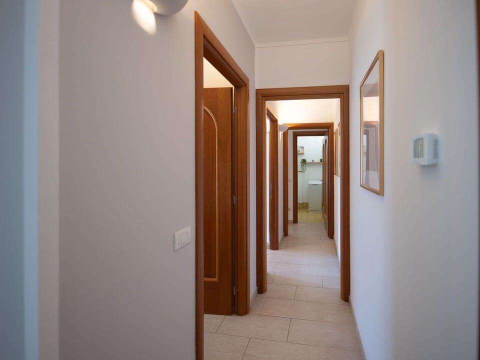 Flooring, Interior Design, Floor, Apartment, Balcony, Ceiling, Condominium, Chair, Shade, Porch