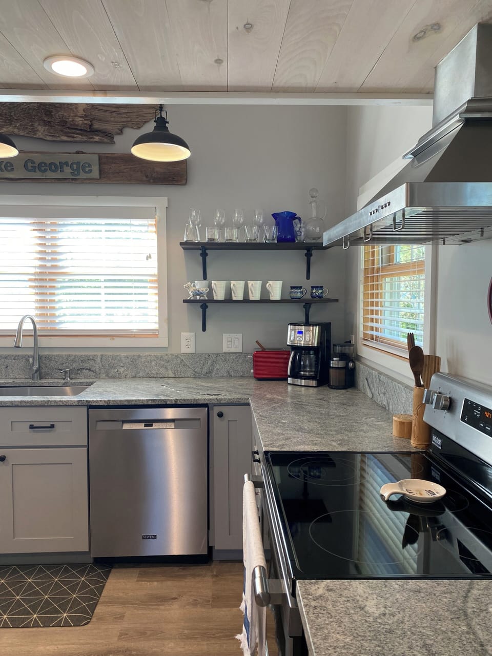 Electric stovetop and large oven.  Full coffee station