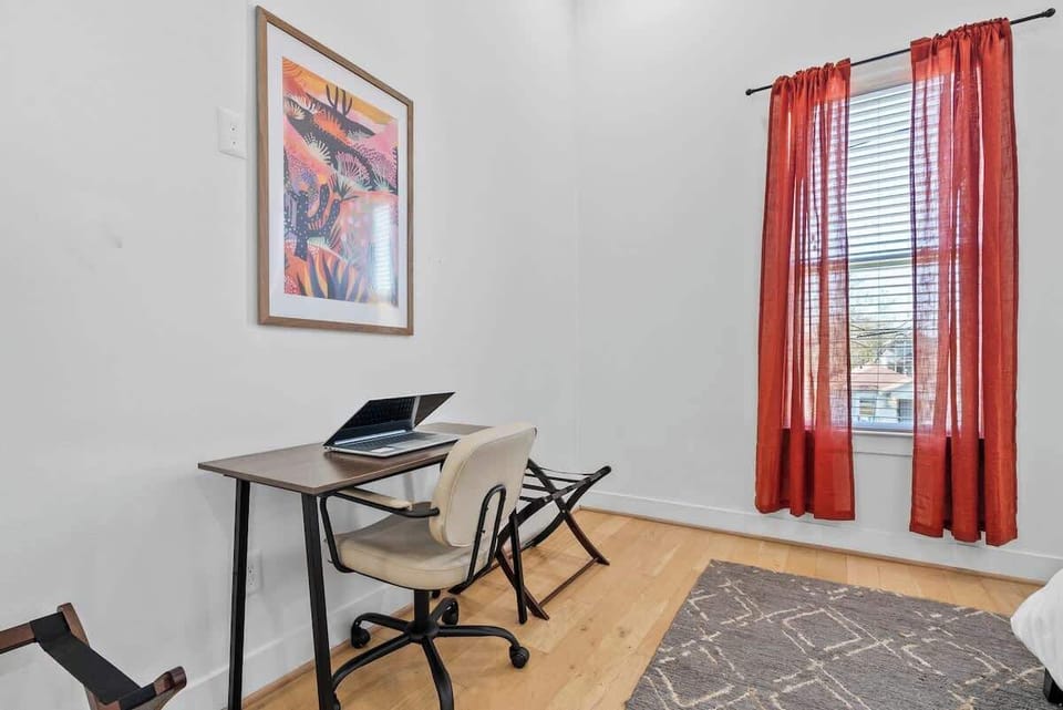 Our master bedroom includes a dedicated workspace, perfectly suited for when you need to focus or catch up on work, all within the comfort of your private retreat.