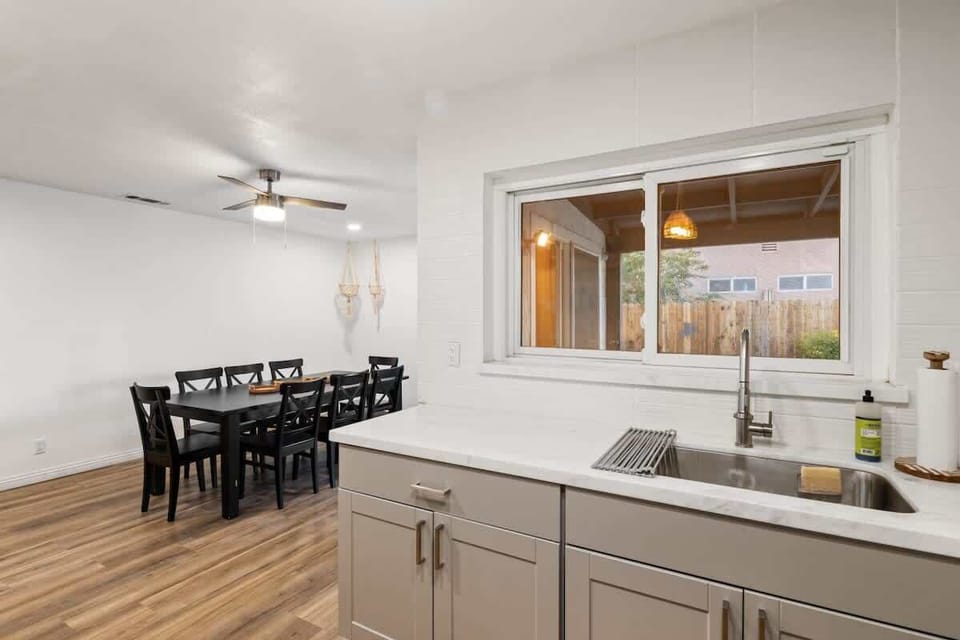 Modern kitchen with stainless steel appliances and plenty of space to cook and gather
