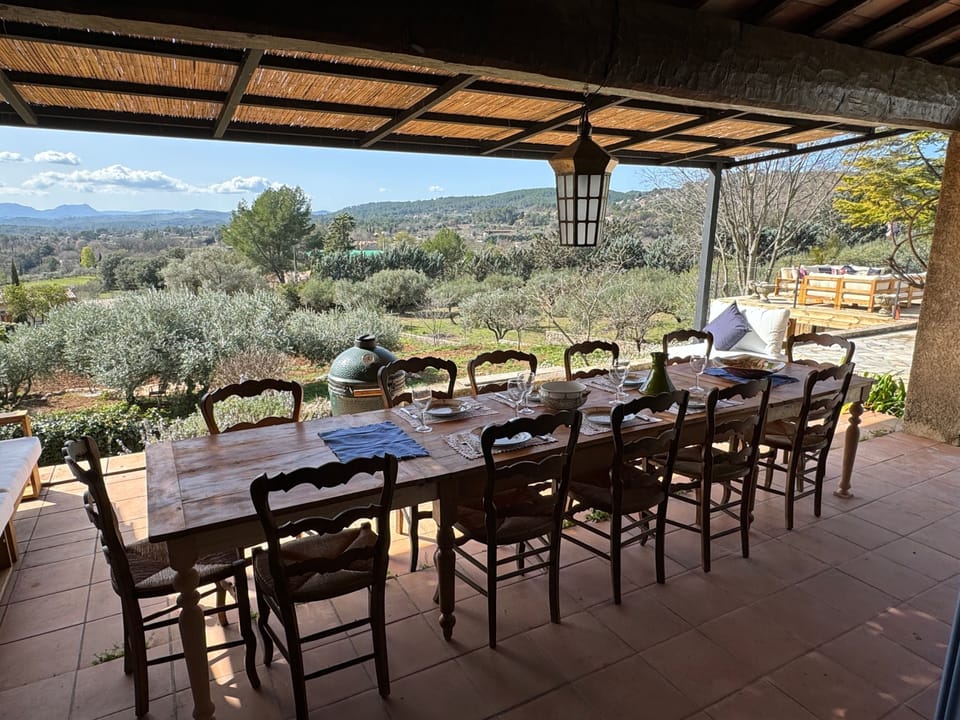 Main terrace with direct access from the dining rom.  Large 12 seat oak table with exceptional views.