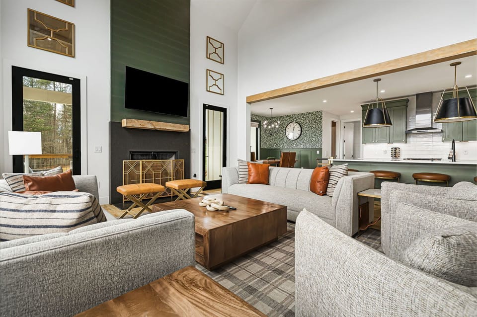 Experience elegance in our professionally designed living room, featuring stunning custom trim work and refined décor. A luxurious space crafted for comfort, style, and relaxation, perfect for gathering and making unforgettable memories.