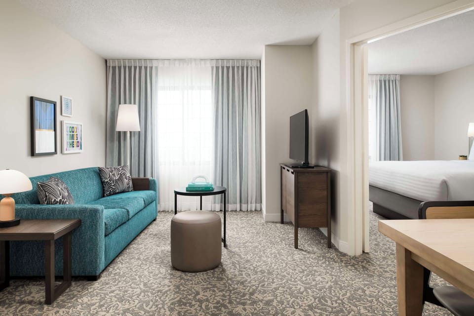 Living area. Exact unit will be assigned upon arrival. Views, colors, and decor may vary.