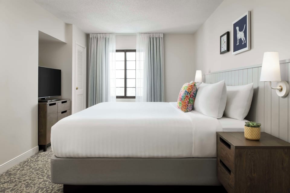 Unit with 1 King bed and 1 Queen bed. Exact unit will be assigned upon arrival. Views, colors, and decor may vary.