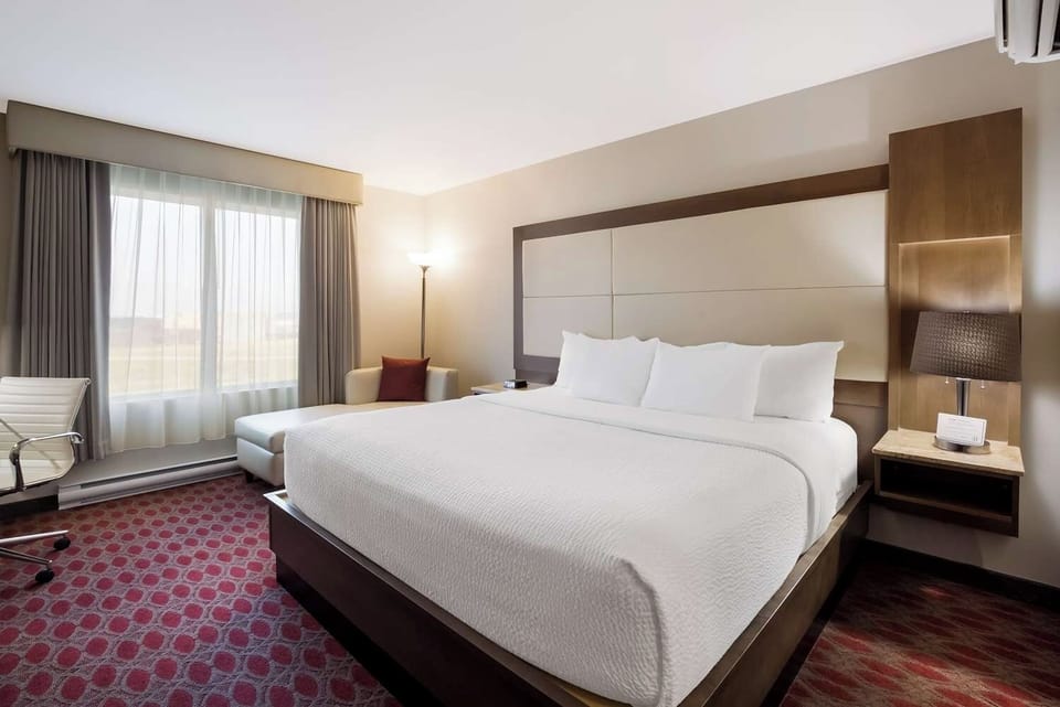 Wake gently to daylight streaming through oversized windows.