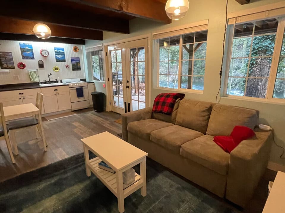 Lower Main room: Sofa pulls out to queen size luxury memory foam mattress, if needed. Coffee table doubles as nightstand.