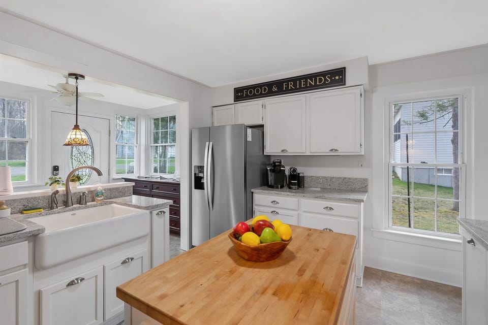 Enjoy cooking in this fully functional kitchen with modern amenities and a cozy feel.