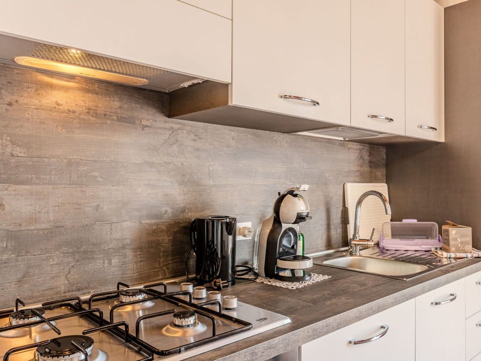 Kitchen, Countertop, Kitchen Appliance, Major Appliance, Wood, Home Appliance, Cabinetry, Flooring, Interior Design, Home
