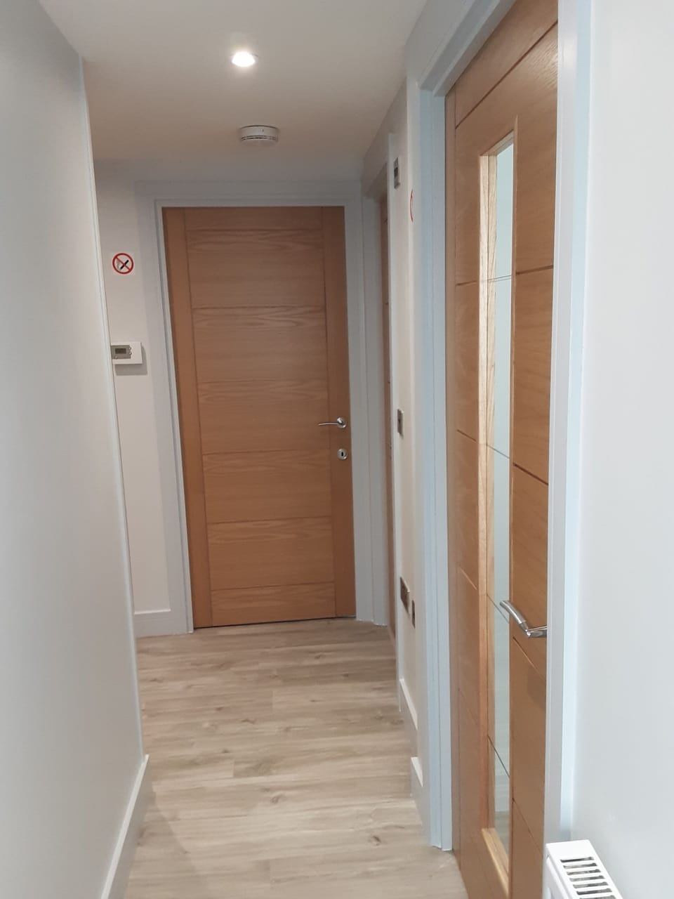 HALL LEADIING INTO ROOMS