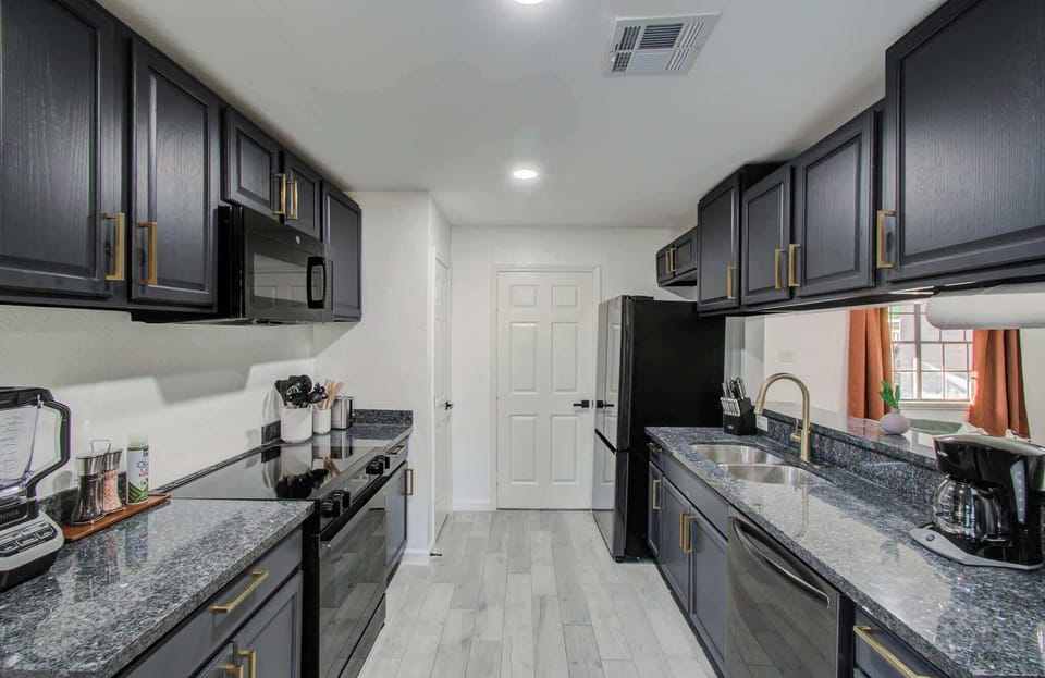 With a functional galley layout and a convenient peek-through window, this fully equipped kitchen has everything you need to whip up a tasty meal for yourself and your companions.