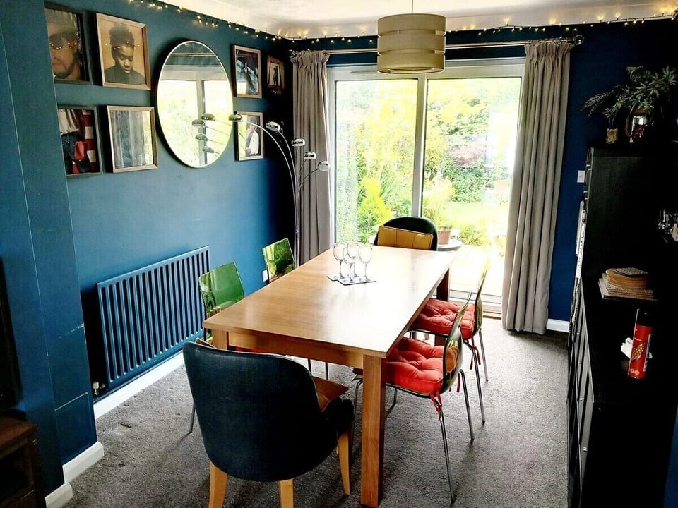 Dining table and 6 chairs with beautiful view of the garden.