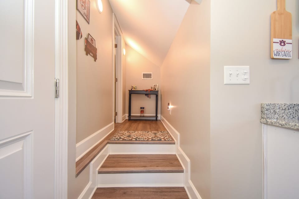 Steps to bathroom from kitchen