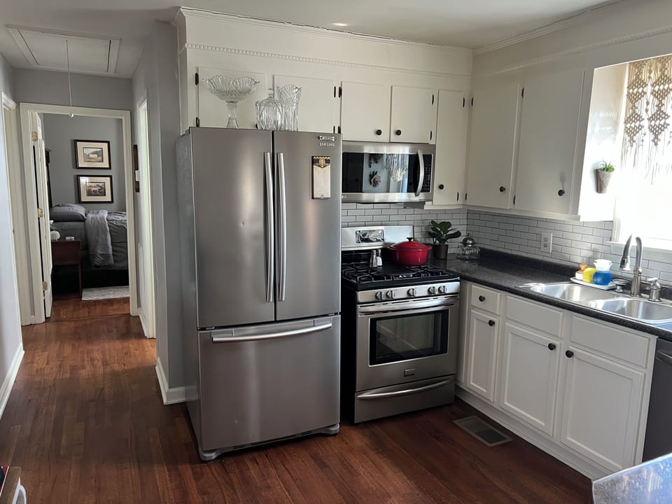 Kitchen includes gad stove, microwave & dishwasher