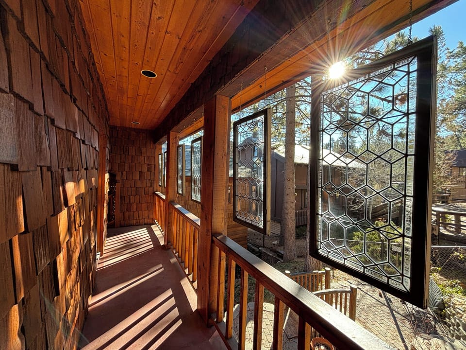 Covered walkway from the driveway to the front door protects from rain and snow
