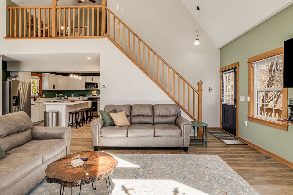 Family room with beautiful high ceilings and an abundance of natural light!