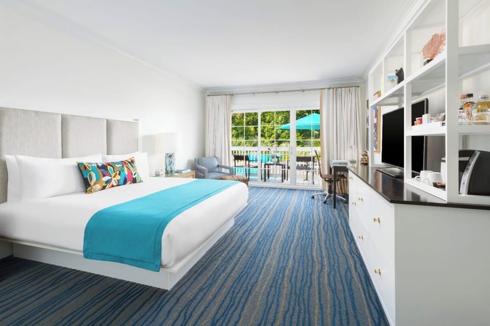 Stretch out in a spacious room with breezy indoor-outdoor lounging.