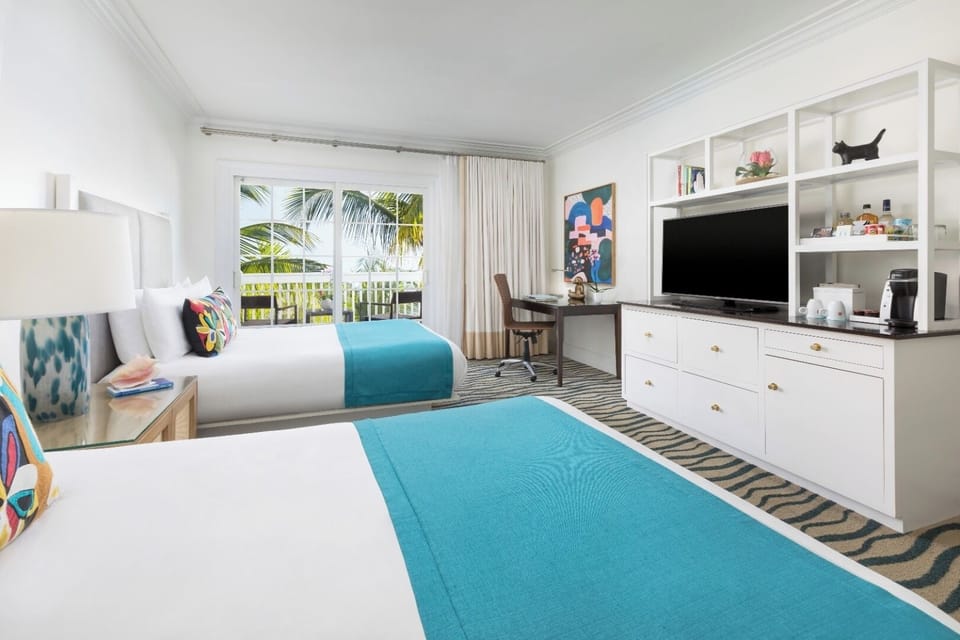 Recharge in a bright double-queen room with resort-style ease.