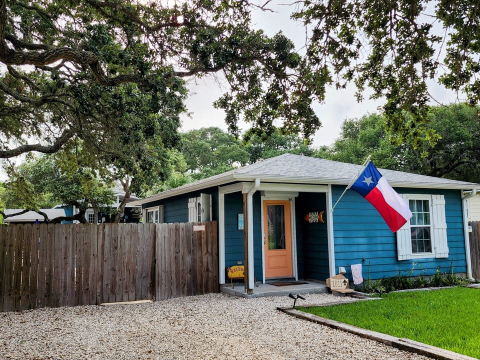 Parking in front - 1011 N Austin St - to the right, 50 amp service for RV or EV