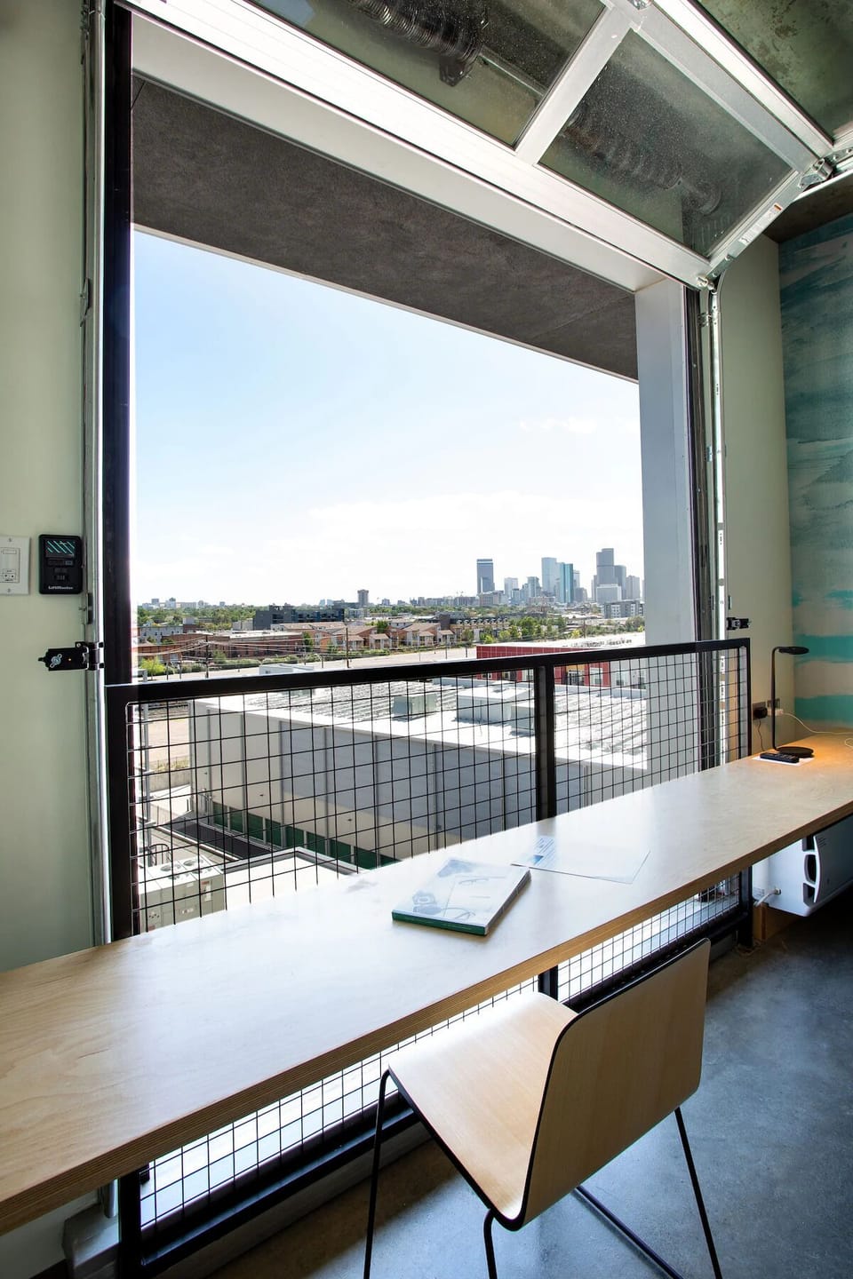 Work or sip coffee while the city stretches below.