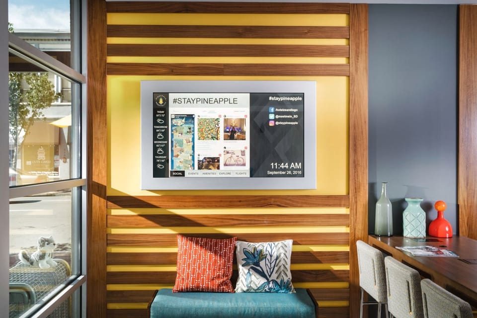 Plan your day from the cozy bench and info wall.