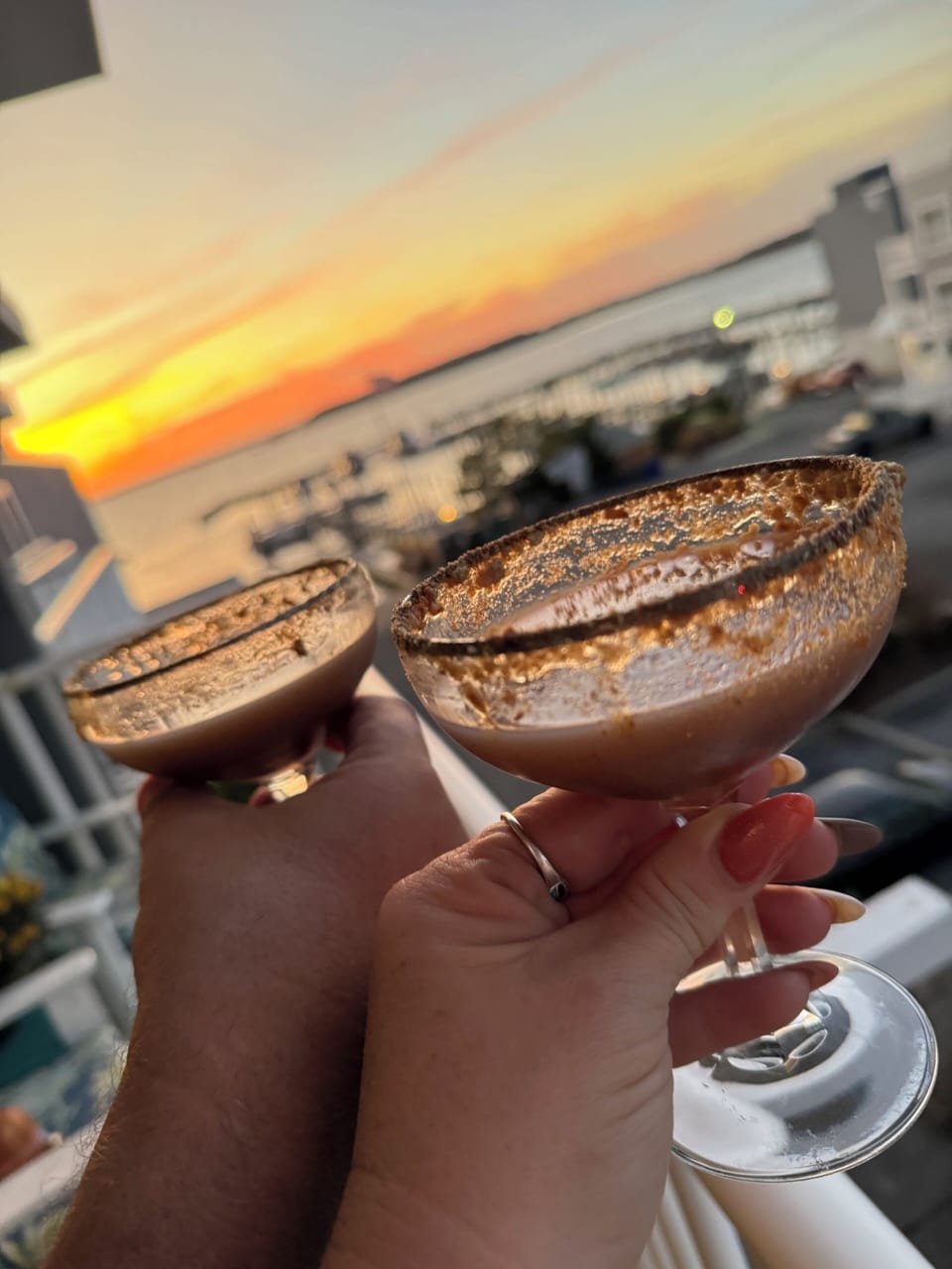 Sunset martinis! Enjoy ocean breezes & Rehoboth Bay boats from our two balconies