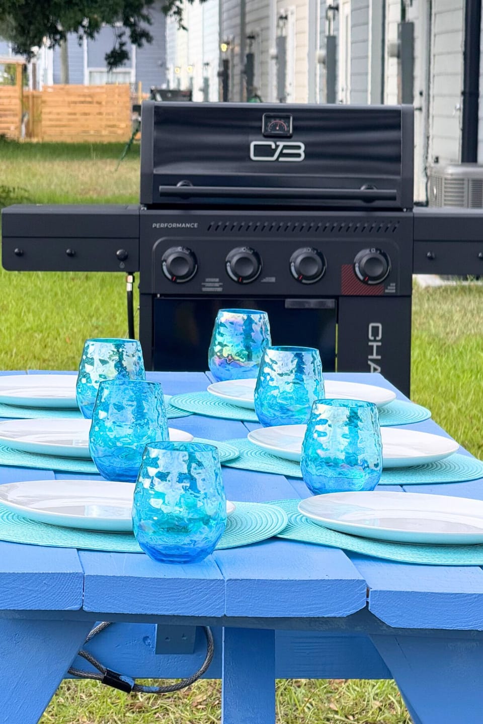 Enjoy the grill for gatherings in the backyard.