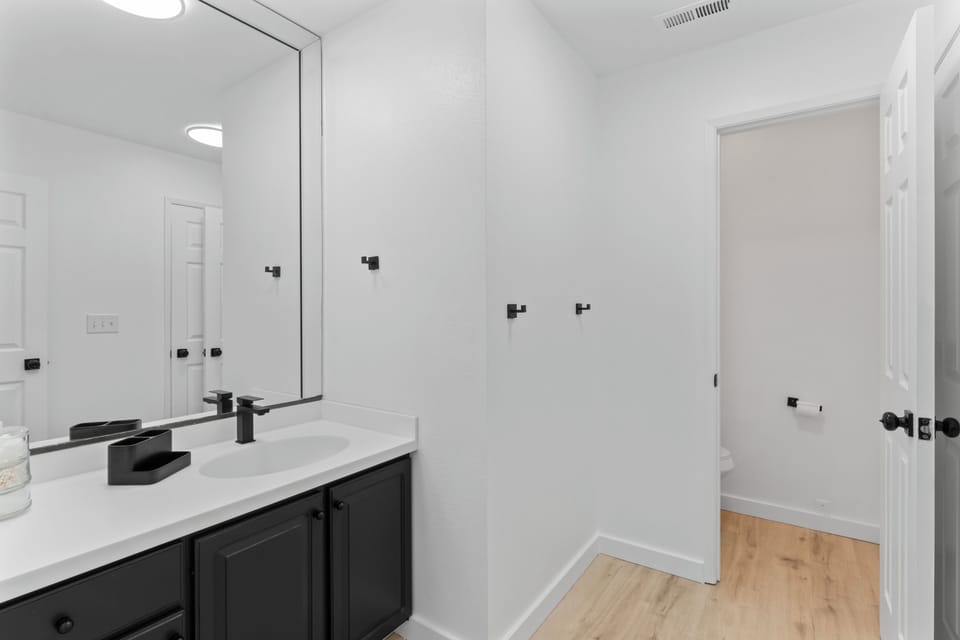 Upstairs full hall bath w toilet room and separate room with shower/bath combo