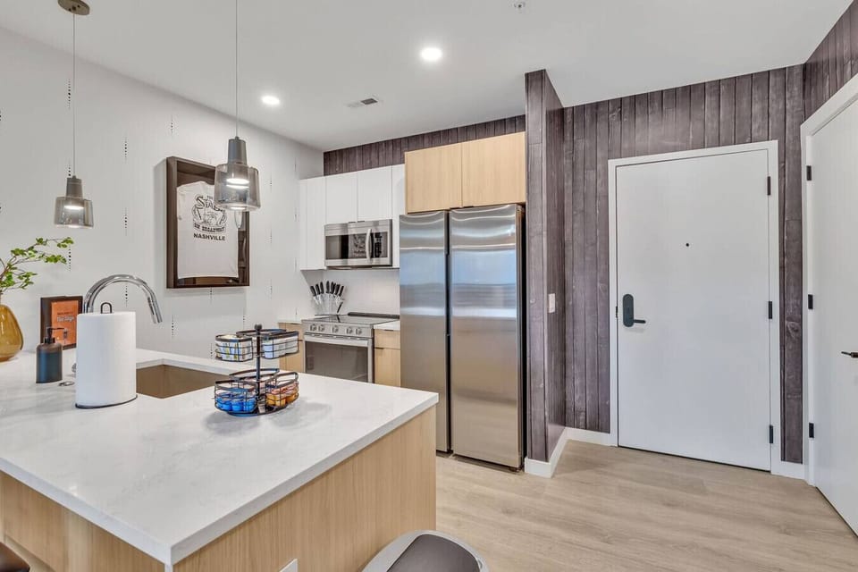 The Stage Fully equipped kitchen with complete with Keurig coffee maker and coffee bar!