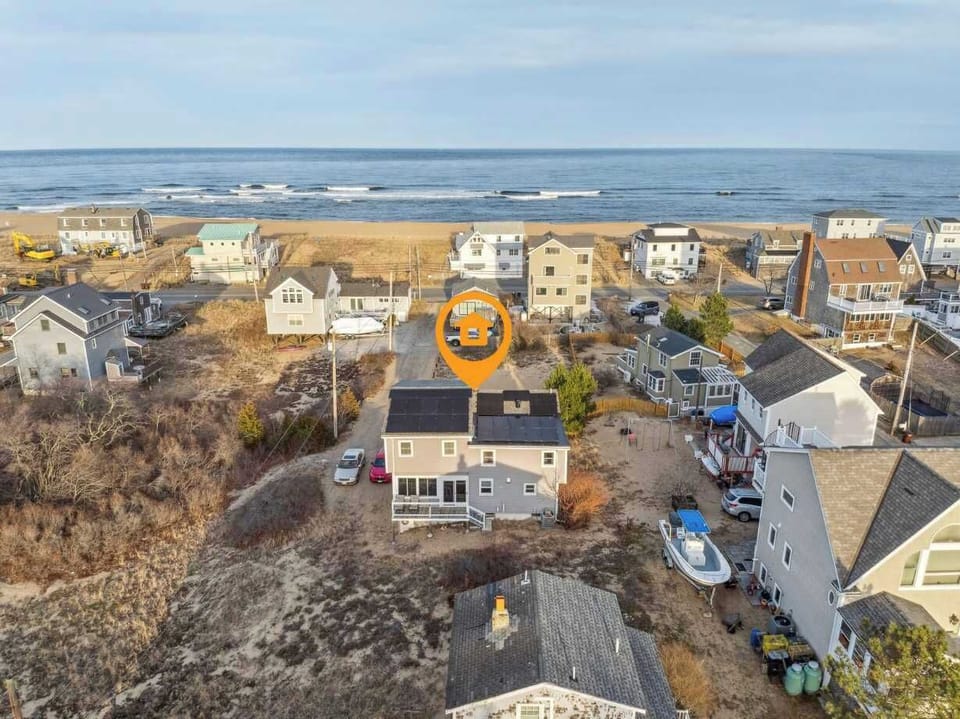 An aerial of the home. It is located just steps to the beach!